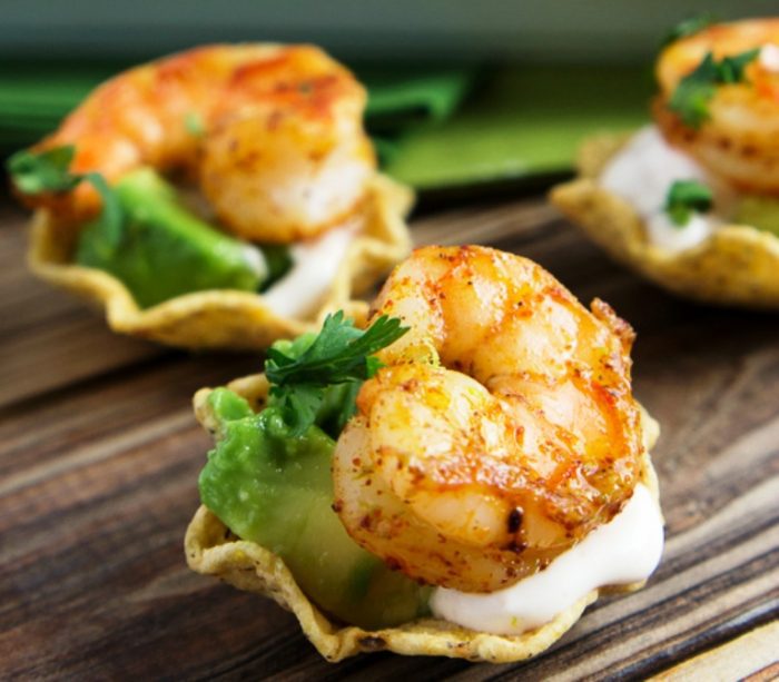 Shrimp Taco Bites are bite-sized appetizers filled with creamy avocado, tender shrimp and a zippy sour cream sauce!