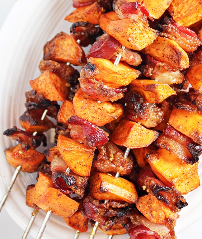 Sugar and spice and everything nice…that’s what this Spiced Sweet Potato and Bacon Skewers recipe is made of! An easy side dish, perfect for fall.