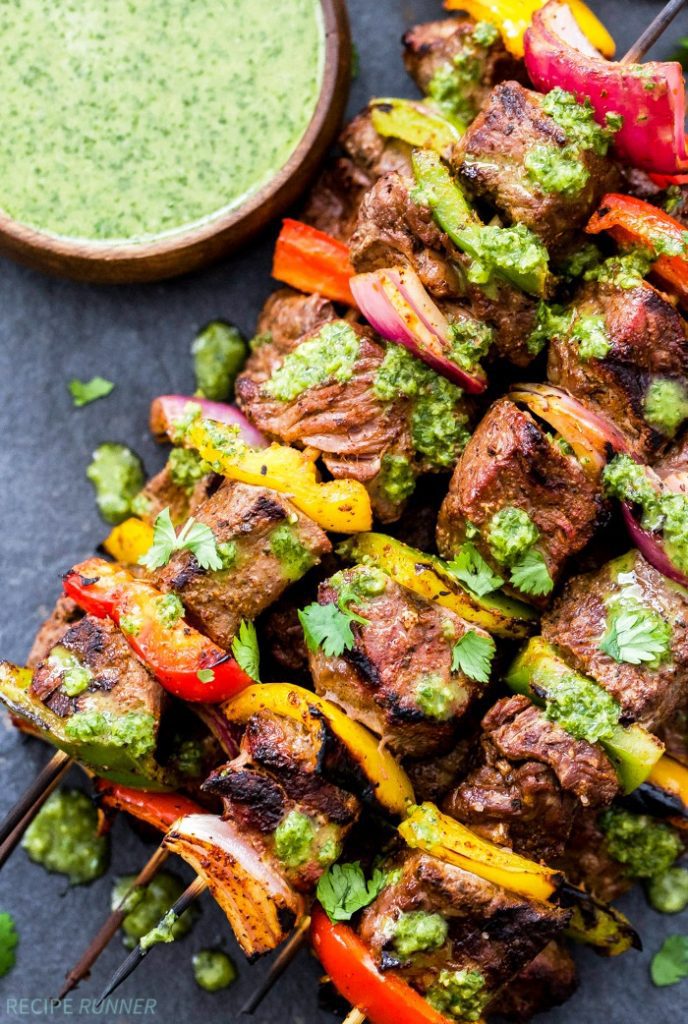 Steak Fajita Skewers with Cilantro Chimichurri are perfect for summer grilling! Big, juicy pieces of steak, sweet bell peppers and red onion all topped with an amazing cilantro chimichurri sauce. Healthy grilling never looked so good!