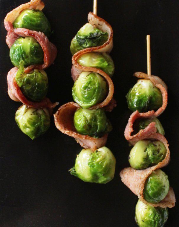 When it comes to pleasing people who are low-carb or following the paleo diet, you can't go wrong with a little bacon! Simple bacon and brussels sprout skewers are a Paleo-friendly and naturally gluten-free appetizer that come together in just a few steps