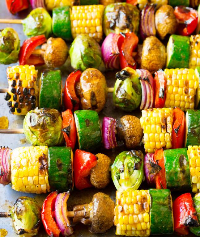 Amazing Grilled Vegetable Kabobs: A healthy vegetarian skewer recipe loaded with fresh summer veggies and“fajita butter.”A fabulous side dish for picnics!
