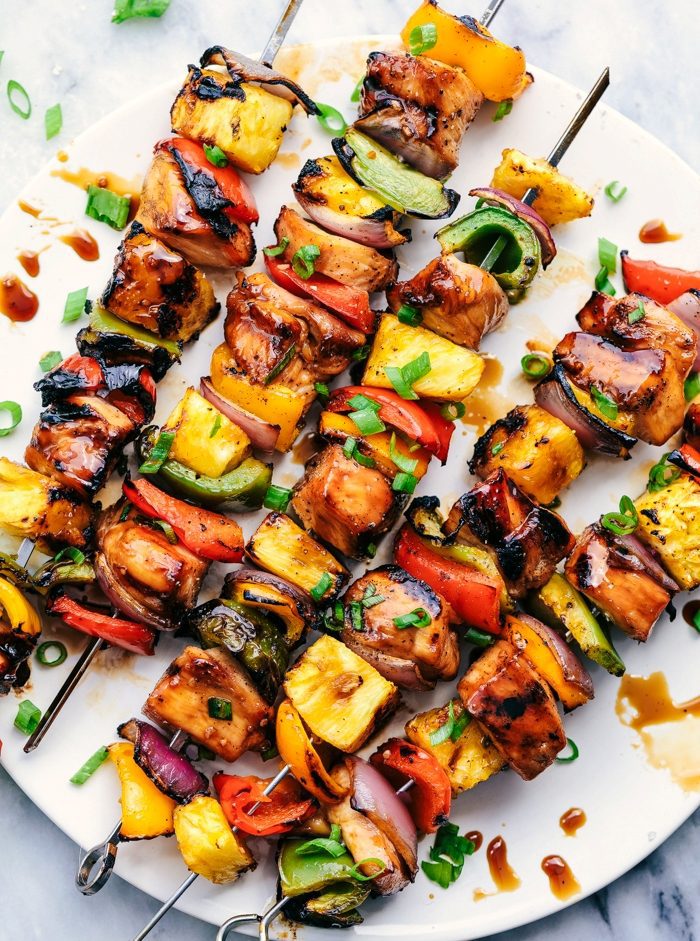 Grilled Hawaiian Teriyaki Chicken Skewers marinate in the very best homemade Hawaiian teriyaki sauce! Loaded with peppers, fresh pineapple and red onions, these make an incredible and vibrant meal.