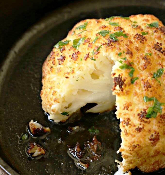 This is the most delicious cauliflower recipe you’ll eat and on top of that it’s such an easy addition to include a roasted cauliflower in your family’s dinner plan or for a dinner party with friends.