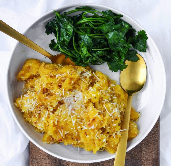 Spaghetti Squash stuffed with a creamy, cheesy, chicken and broccoli filling and topped with more melted cheese.