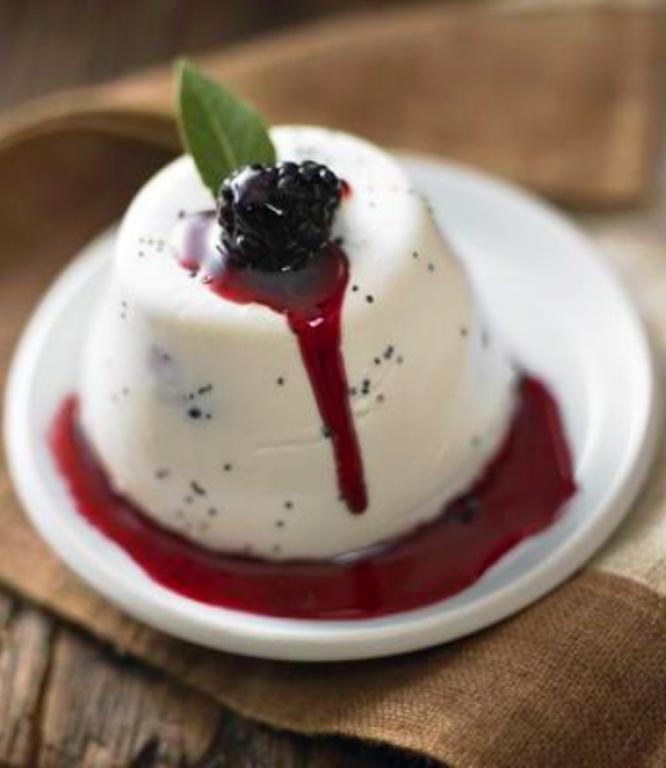 Panna cotta is a luxurious creamy Italian dessert that is dead simple to make. Milk is heated until bubbles just begin to appear on the side of the pan. Gelatin, vanilla beans, and sugar are added and then the mixture is poured into individual cups.