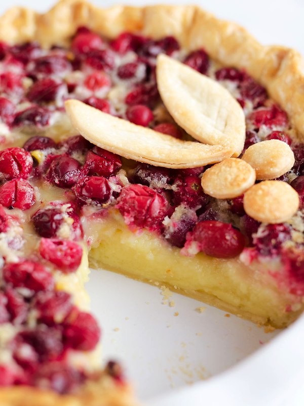 A flaky pie crust is filled with sweet custard laced with orange zest and tart cranberries for a special Cranberry Pie you will love.