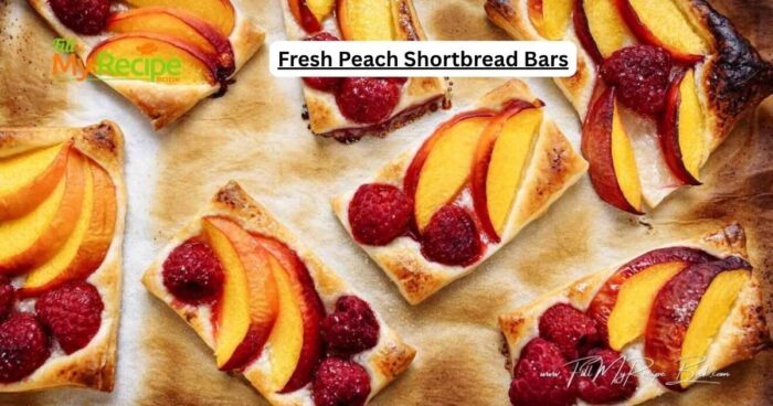 Bake Fresh Peach Shortbread Bars with raspberries recipe. A delicious dessert with every bite. Juicy oven baked peaches layered over a buttery shortbread crust.