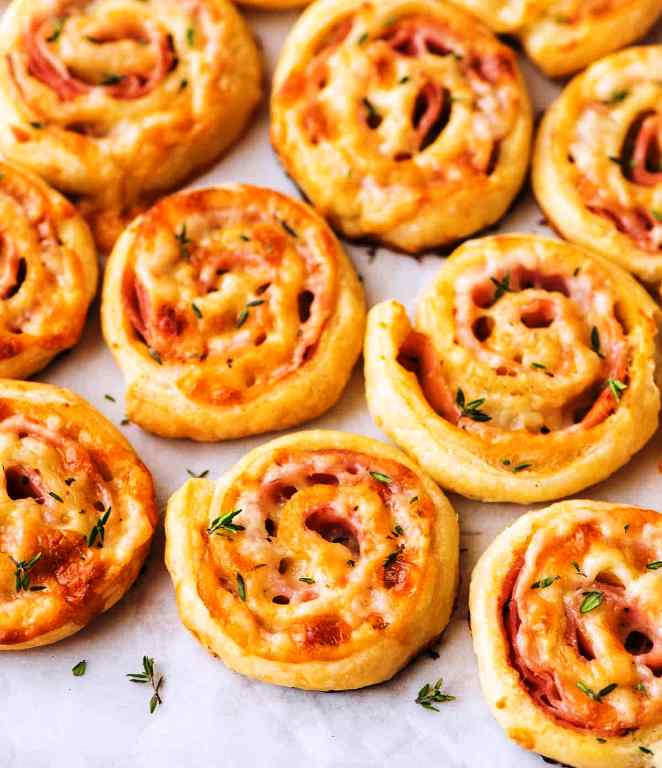 a homemade fancy sauce, and some kind of European cured meat, let me tell you a little secret: it’s actually these four-ingredient Ham and Cheese Pinwheels.