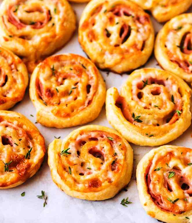 a homemade fancy sauce, and some kind of European cured meat, let me tell you a little secret: it’s actually these four-ingredient Ham and Cheese Pinwheels.