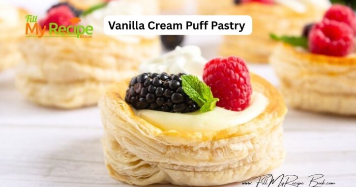 An easy Vanilla Cream Puff Pastry recipe idea for a dessert. Oven baked, topped with whipped cream and garnished with raspberries, mint.