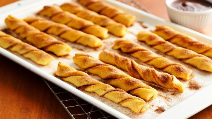 This speedy version of churros using Pillsbury crescent rolls is ready in 30 minutes, which means you can enjoy the cinnamon-sugar treat whenever you're craving something sweet! Baked Crescent Churros are a great option for a quick and easy weeknight dessert or a sweet snack.