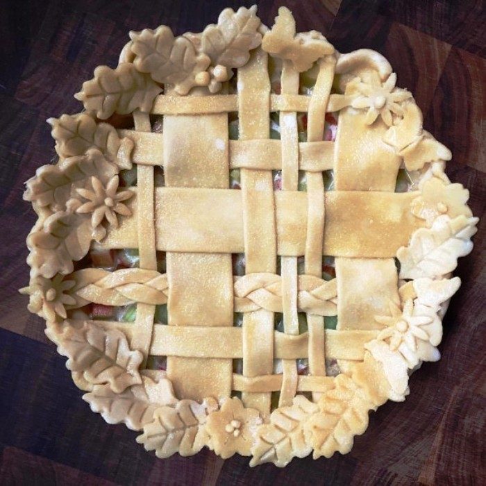A Strawberry Rhubarb Pie with a decorative pie top that was so much fun to design. I finally understood the allure of fancy crusts,