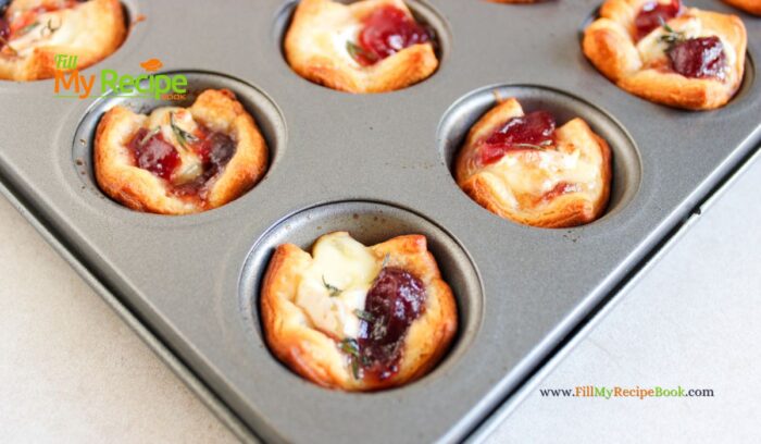 The most delicious mini Cranberry Brie Puff Pastry Bites appetizer recipe idea. Simple to make ahead for a sweet and savory holiday snack.