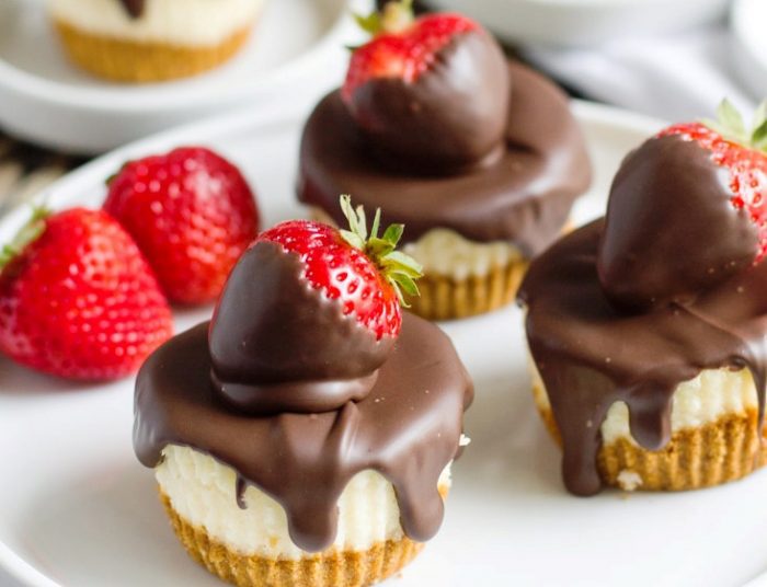 The best way to serve these classic mini cheesecakes is with chocolate covered strawberries on top.