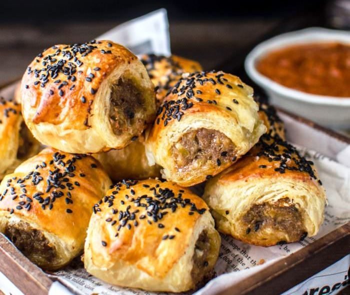 Juicy, slightly sweet, slightly spicy and well seasoned ground pork filling mixed with deliciously caramelized apple and roasted fennel spice, wrapped in a golden brown, buttery, flaky puff pastry.