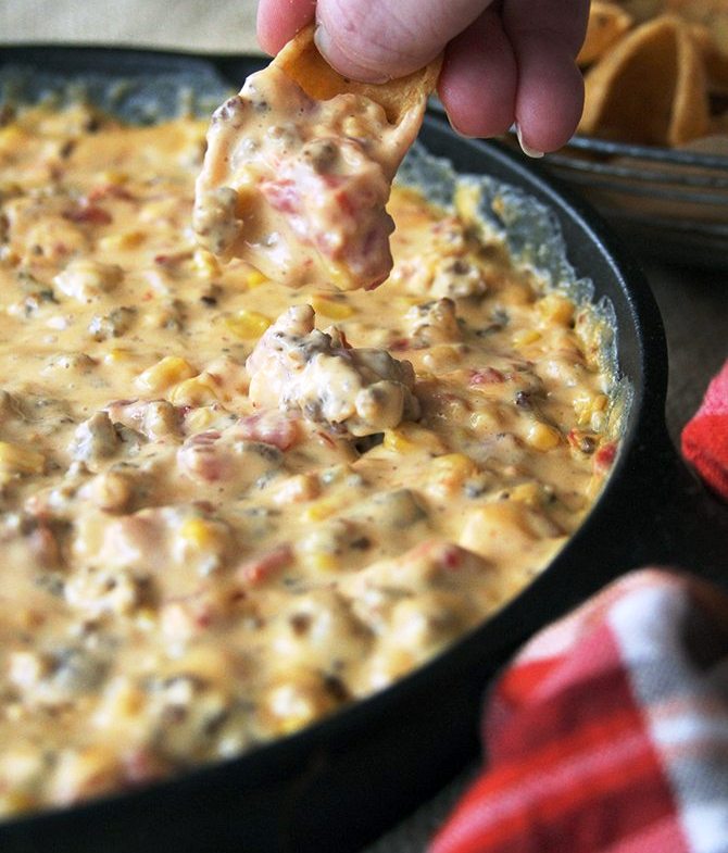 This Cheesy Sausage Dip recipe is an appetizer staple filled with rich cheesy flavor and savory sausage. And, you can make it in the slow cooker!