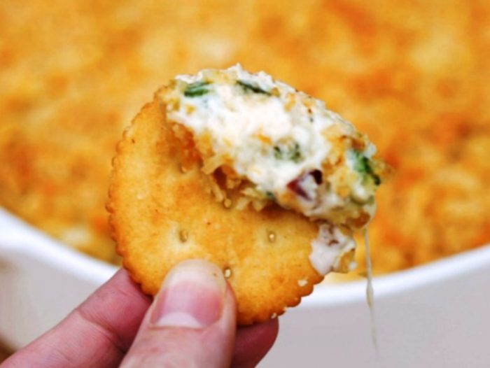This easy Jalapeno Popper Dip makes the perfect appetizer for bridal showers, baby showers, football games, tailgating, and game nights. Hot – but not too spicy – it’s a great party dip that anyone can make!