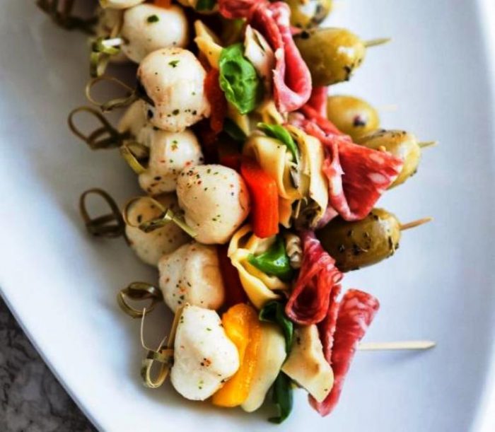 These crowd pleasing antipasto skewers make an easy party appetizer or a fun addition to a charcuterie board.