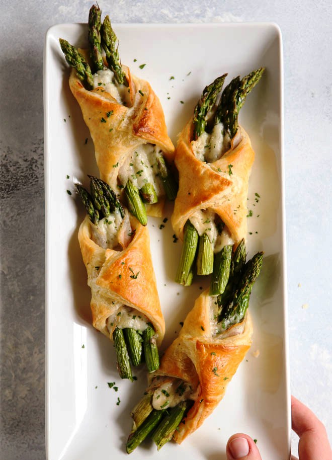 I love these little bundles of springtime— asparagus, pancetta, and parmesan cheese wrapped in flaky puff pastry.