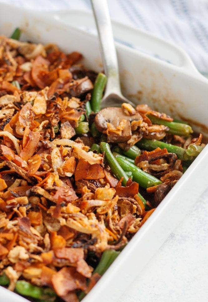 These days I’m all about more veggie, less other stuff, which led me to develop this lighter, dairy-free green bean casserole topped with crispy shallots and (surprise!) coconut bacon.