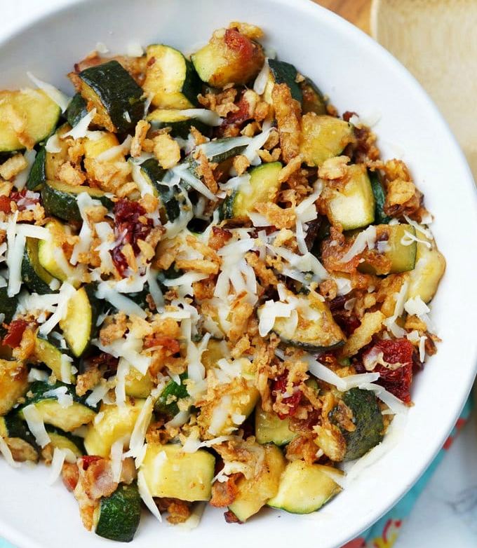 Zucchini-with-sun-dried-tomatoes-bacon-and-crispy-onions