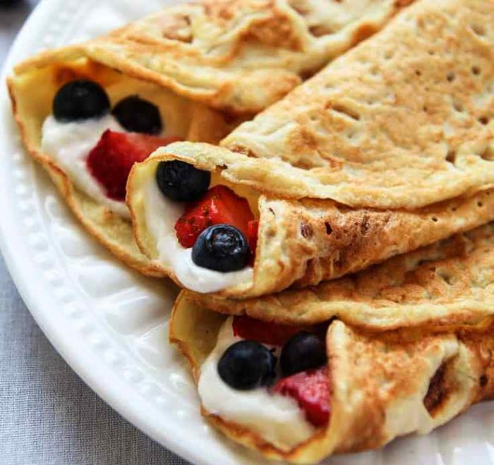 These Coconut Flour Crepes are gluten-free, low-carb and paleo. Add your favorite savoury or sweet fillings like whipped cream and berries for a wholesome treat.