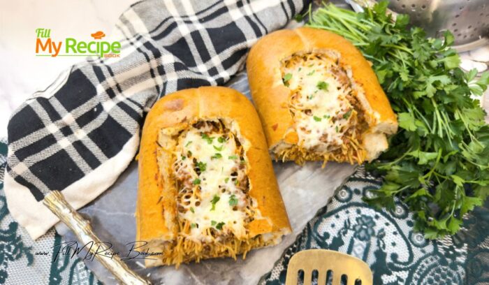 Easy Spaghetti Stuffed Garlic Bread recipe. Easy and quick oven bake or grill loaf filled with ground beef and pasta sauce, with cheese.