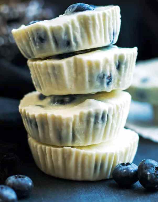 A healthy afternoon snack or dessert recipe for frozen Greek yogurt bites.  Lemon and blueberry flavors combine to make them a super fresh and fruity gluten free treat.