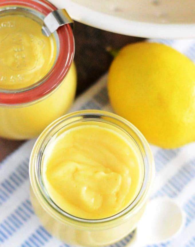 This Paleo Lemon Curd recipe is bright, fresh, and lightened up. It’s made with whole eggs, honey, and coconut oil so it’s a much healthier version then you’re used to.