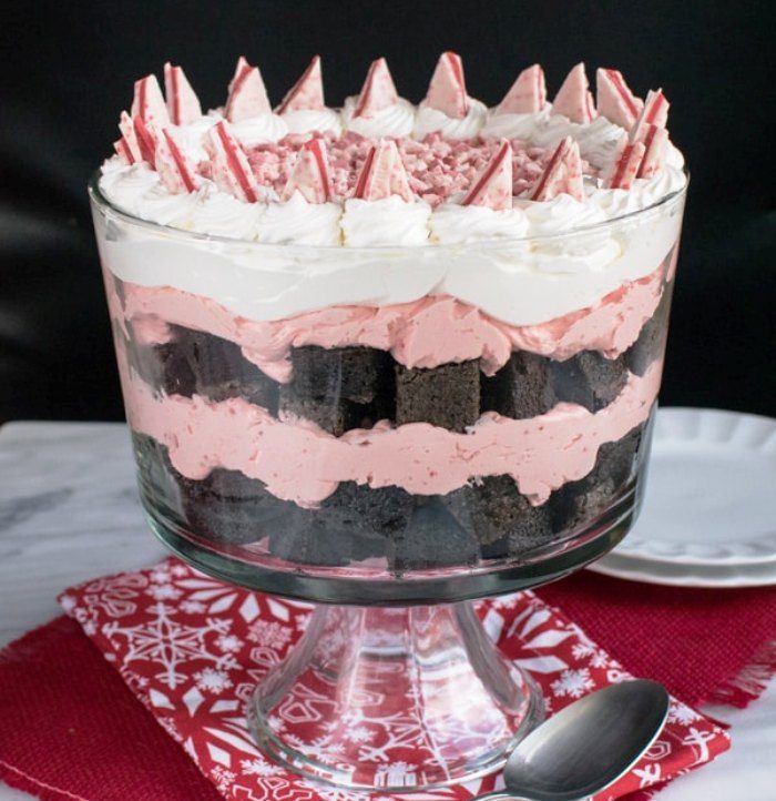 Layers of homemade brownies and a no bake peppermint cheesecake make this Peppermint Brownie Trifle an impressive dessert to bring to holiday parties.