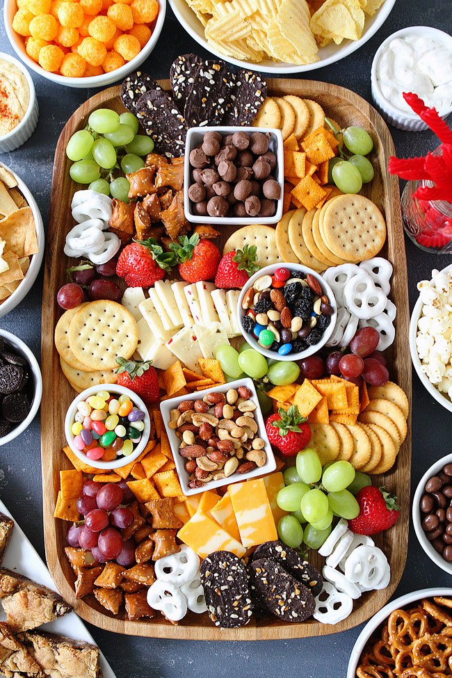 Sweet and Salty Snack Board-the perfect party food for easy entertaining. You will love the mix of sweet and salty snacks for game day or any party.