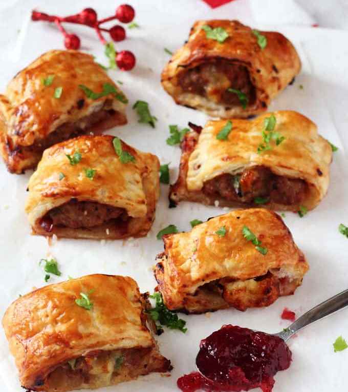 A delicious festive take on the classic sausage roll, made instead with turkey mince, cranberry sauce and brie. These turkey cranberry & brie rolls will make a fantastic appetizer or party snack this Christmas!