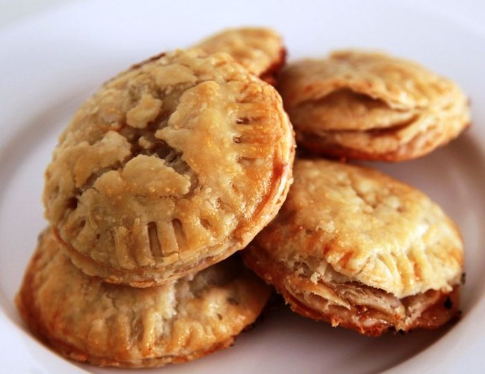 Instead of puff pastry, I opted to use pie crust. I envisioned creating little Pop-Tarts pastries, filled with brie and fig preserves. Rather than cut the rectangular shapes by hand, I used a round cookie cutter, because it makes for an easier, faster prep than measuring and hand-cutting the dough squares.