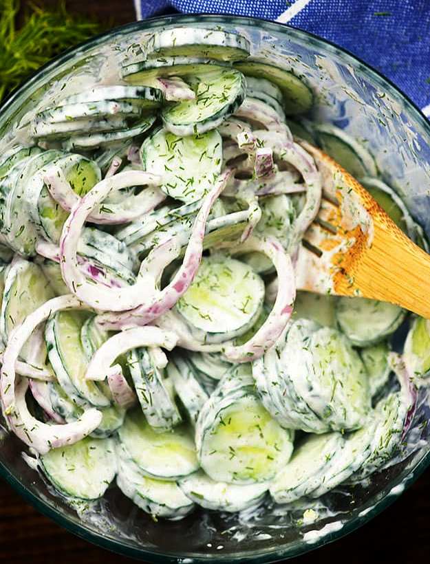 Creamy cucumber salad starts off with English cucumbers, red onion, mayonnaise, vinegar, and dill. It’s a light side dish that is perfect for those hot summer nights and it is really easy to throw together any night of the week!