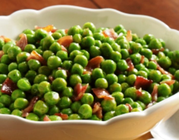 Melt Parkay in large saucepan over medium-high heat. Add peas; cook 5 minutes or until slightly thawed, stirring frequently. Add bacon, brown sugar, mustard and pepper; cook 3 minutes more or until hot.
