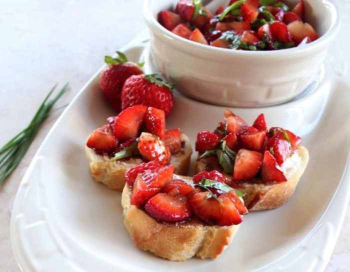 Strawberry Bruschetta is made with fresh basil, strawberries, balsamic vinegar & goat cheese. It’s an easy recipe, made in just 10 minutes, perfect for brunch, appetizers or dessert! It’s wonderful as a Summer snack or the start to a Valentine’s Day meal!