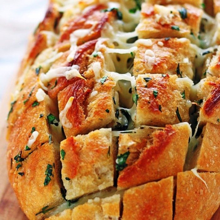 tasty filled bread recipe of Cheesy-garlic-herb-crack-bread