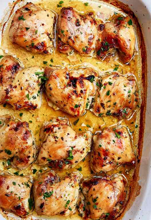 Baked chicken thighs, flavored with maple syrup, apple cider vinegar, fresh garlic, parsley and a touch of sesame oil. Slightly sweet, slightly sour and so delicious. They are to die for. My kids absolutely love these chicken thighs