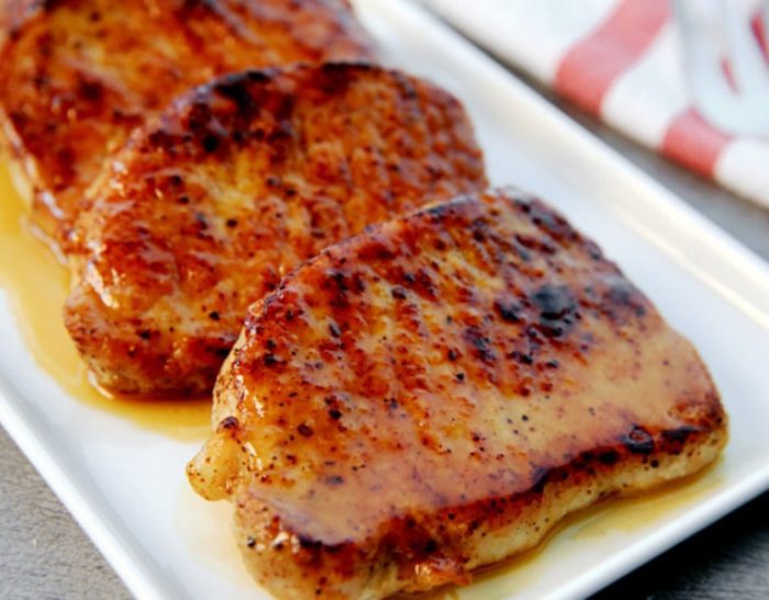 Pork chops are simple to prepare—simply season them with salt, pepper, garlic powder, a little chili powder and all-purpose flour to create a nice crusty exterior—this will also help the glaze adhere to the meat.