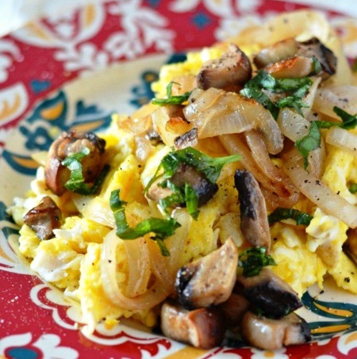 Scrambled-eggs-with-caramelized-onions-mushrooms-and-fresh-basil
