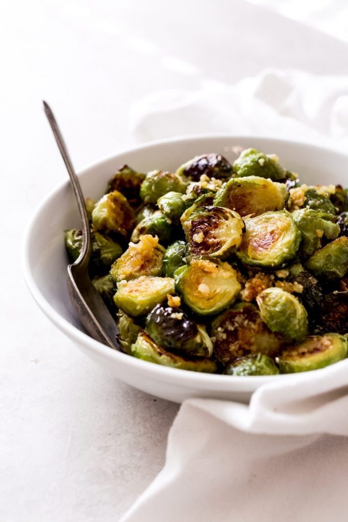 Crazy good Garlic Butter Brussels Sprouts that even the Brussels sprout haters will love! I toss my sprouts in a magical garlic butter sauce that’s loaded with tons of yummy flavor right after they’re roasted. So good you’ll want to make these all the time!