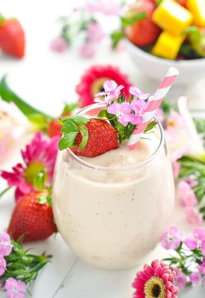 Make a sunny escape in just two minutes with this high-protein, dairy-free Healthy Strawberry Smoothie! It’s the perfect nourishing breakfast or snack option to fuel your busy days — even when you’d rather be lounging on a beach!