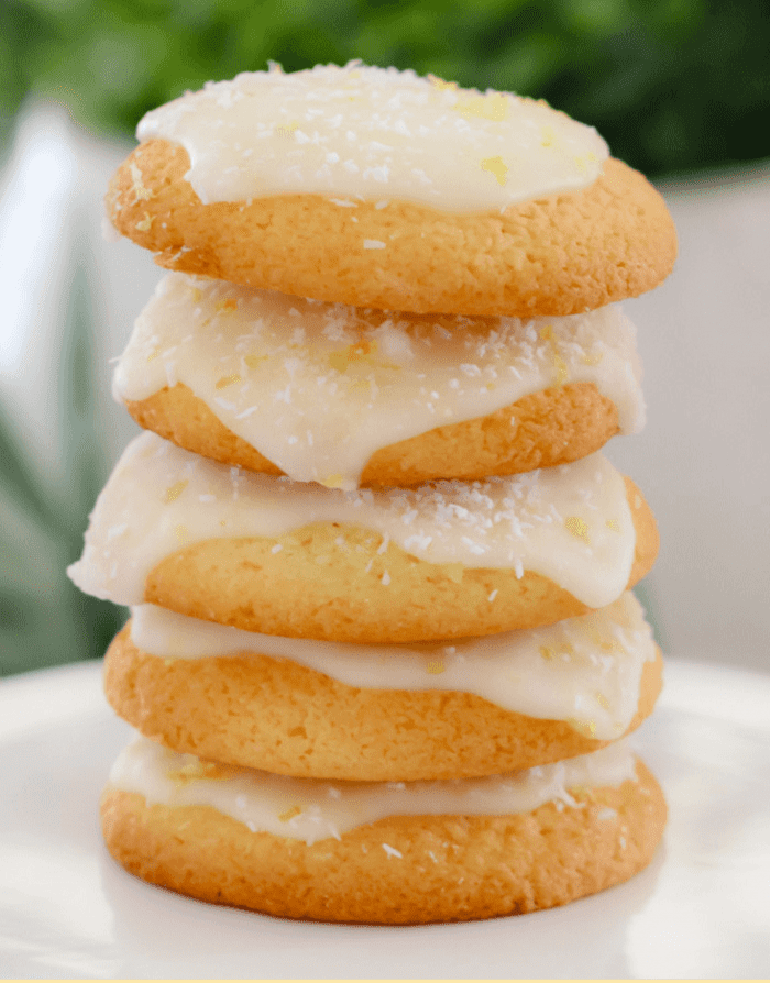 These coconut biscuits with lemon icing have the perfect combination of sweet and tangy lemon zest and melt-in-your-mouth buttery biscuits. A perfect treat for anyone looking for an easy cookie recipe that's ready in 30 minutes.