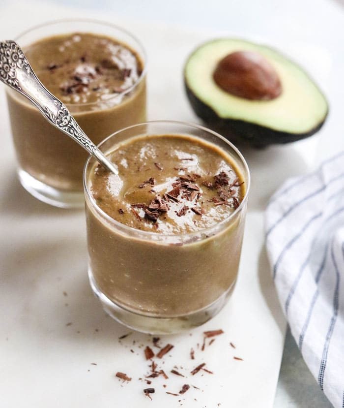 This Chocolate Avocado Smoothie is rich & creamy, and tastes like a chocolate frosty! It’s a delicious way to use up any avocado that you have on hand, without any refined sugar.