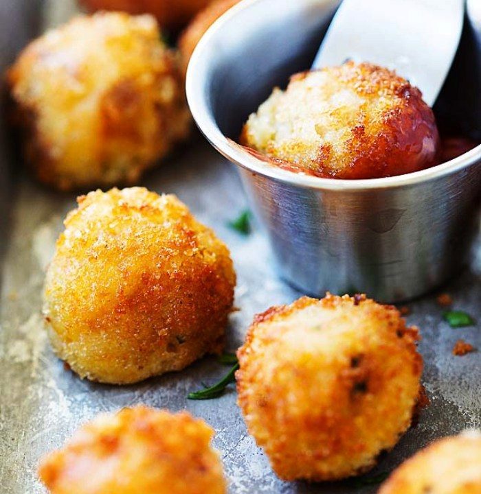 Mashed Potato Balls - crispy fried mashed potato balls loaded with bacon and cheddar cheese. The best recipe to use up leftover mashed potatoes.