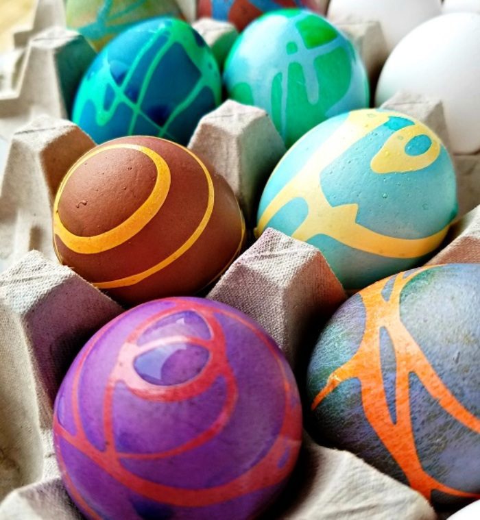 My new favorite way to decorate Easter eggs is now with rubber cement! It makes awesome designs and it's so fun watching them in the new color.