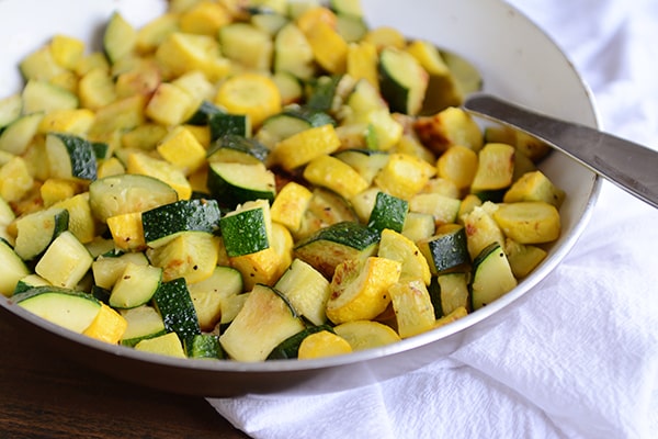 This skillet zucchini and yellow squash recipe is so easy, delicious, and healthy, it is bound to become a summer side dish staple.