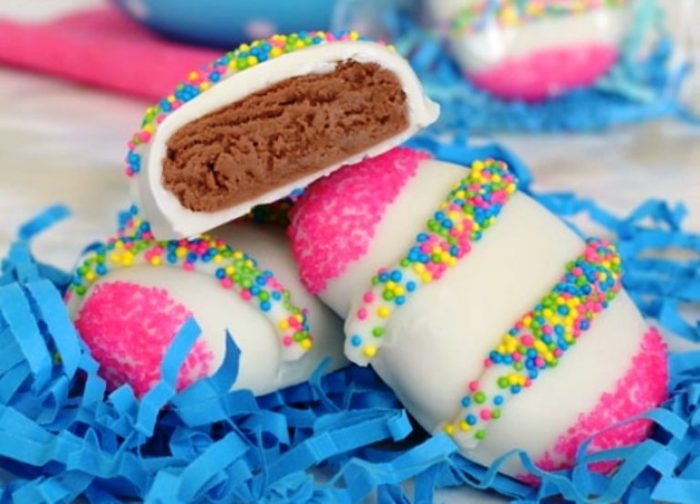 These homemade Nutella Cream Eggs are easy to make and taste amazing. A creamy chocolate filling dipped in white chocolate with colorful sprinkles on top is a fun treat to make for Easter baskets.