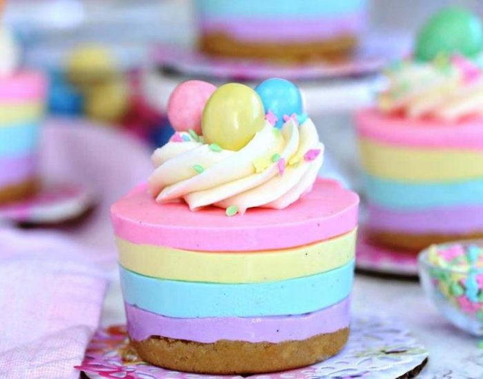 Looking for an easy Easter dessert? These Easter No-Bake Mini Cheesecakes are perfect! Cute pastel striped cheesecakes that are simple to make, no baking required!