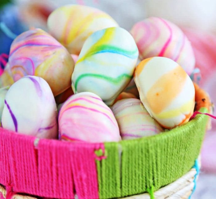 Marbled Easter Egg Truffles are a delicious homemade Easter egg candy! Rich white truffles are coated with a marbled pastel swirl of colors to make these gorgeous treats.